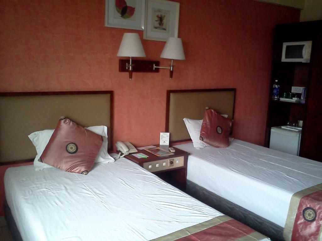Landmark Hotel Calcutta Kamer foto